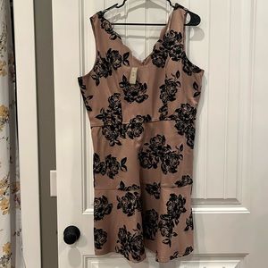 Pink with black raised sleeveless skater dress